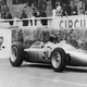 Dan Gurney takes his first Formula 1 win in a Porsche 804 at the 1962 French Grand Prix.